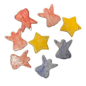 Pendenti natalizi a forma di stelle ed angioletti