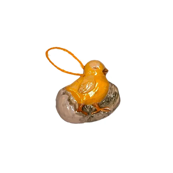 Pendente raffigurante un pulcino