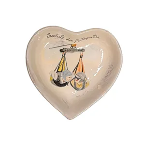 Vassoio piccolo a forma di cuore raffigurante una coppia del Volo dell