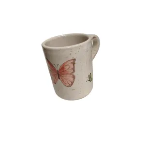 Tazza con farfalle