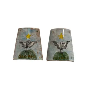 Tegola in ceramica "Calciano" con civetta e stella